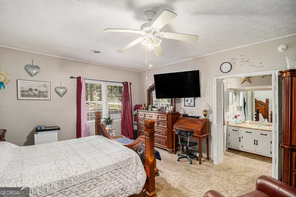 a dining room with furniture and window