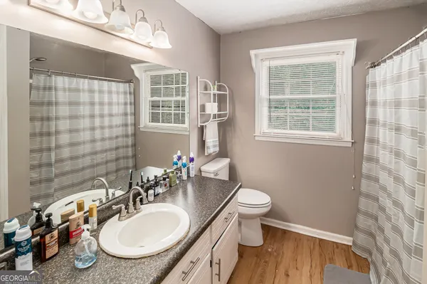 a view of a chairs and table on the deck