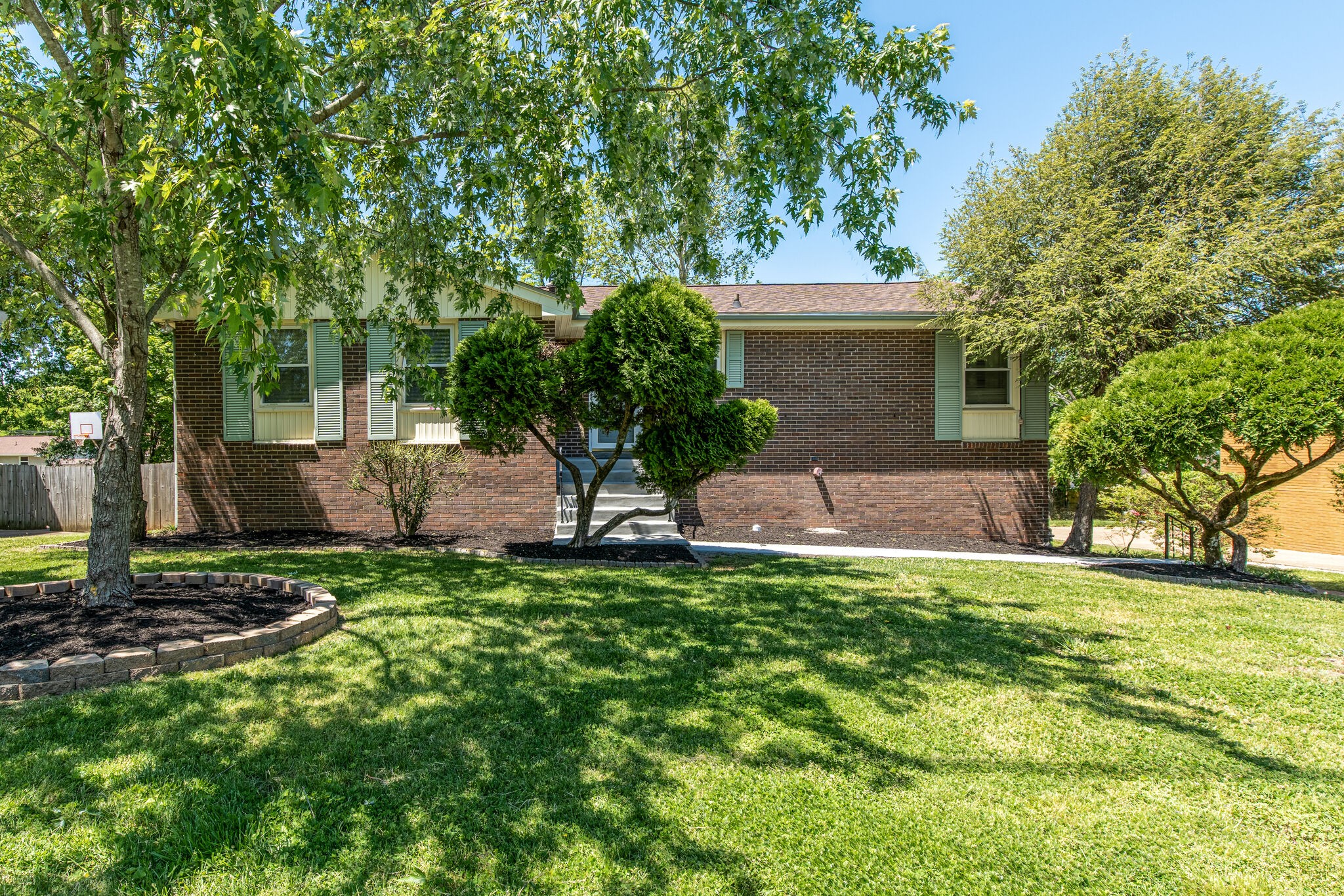 a backyard of a house with seating space