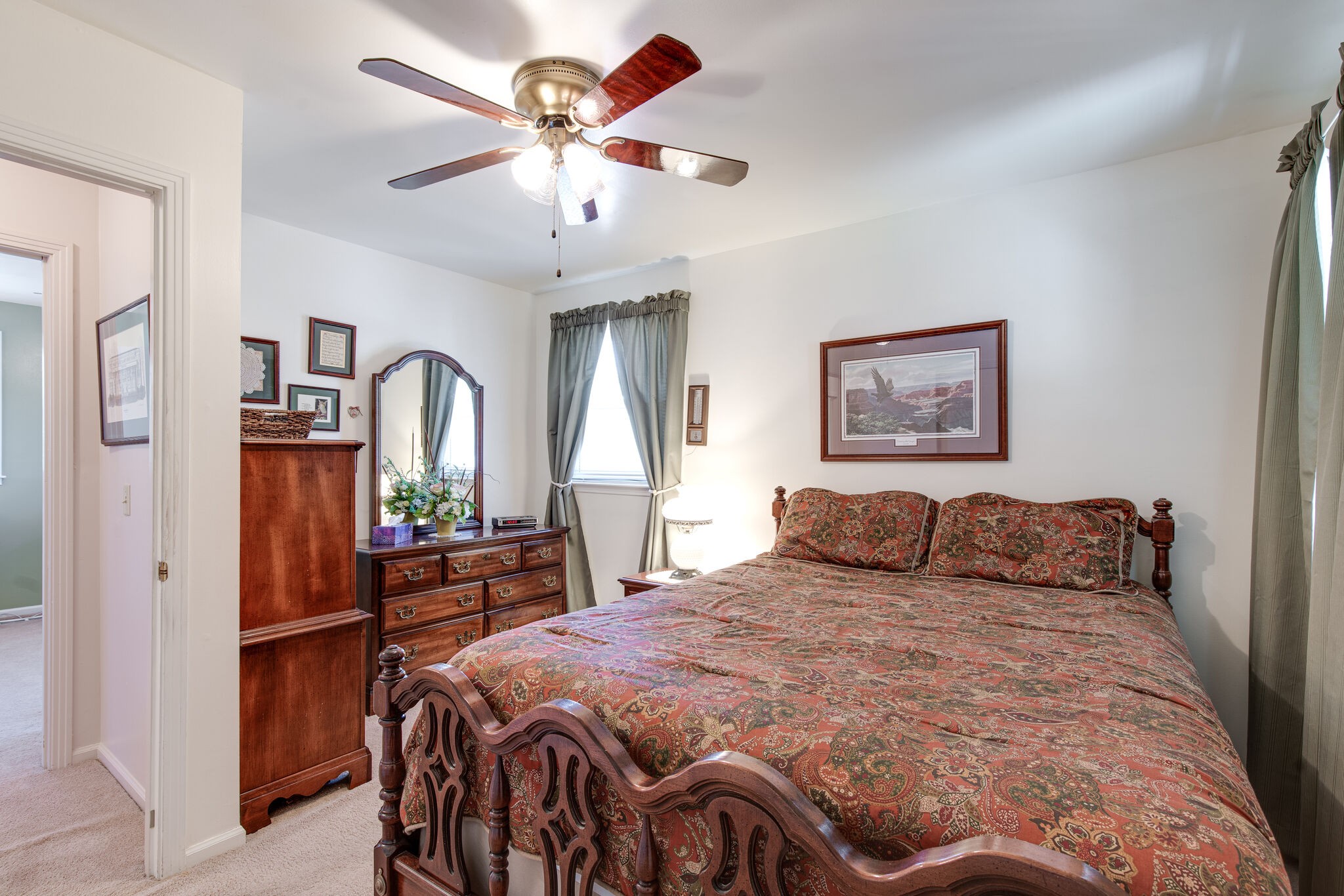 417 Cedarcliff Road Antioch, TN 37013 - Photo 15 of 25 a bedroom with a bed and a chandelier