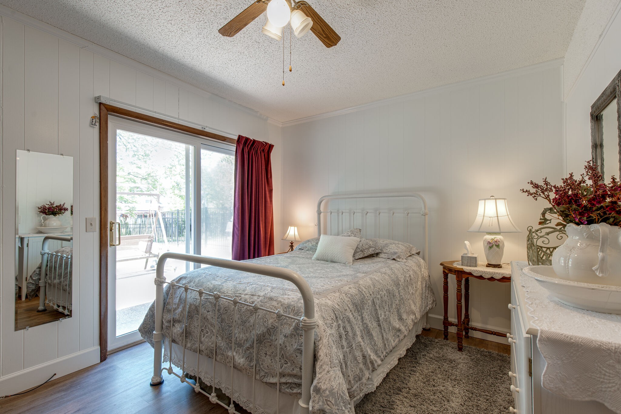 417 Cedarcliff Road Antioch, TN 37013 - Photo 21 of 25 a bedroom with a large bed and a chandelier