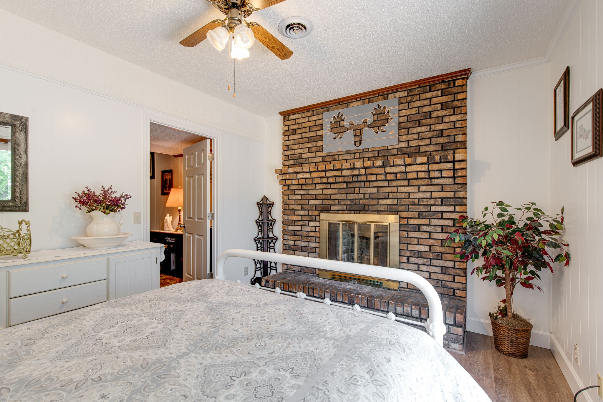 417 Cedarcliff Road Antioch, TN 37013 - Photo 22 of 25 a bedroom with a large bed and a chandelier