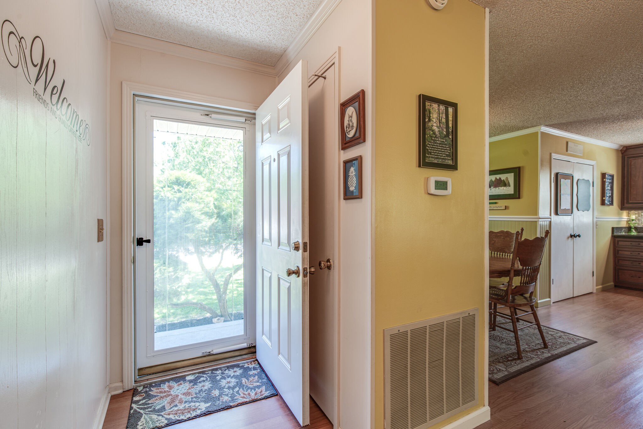 417 Cedarcliff Road Antioch, TN 37013 - Photo 3 of 25 a view of a hallway with wooden floor and furniture