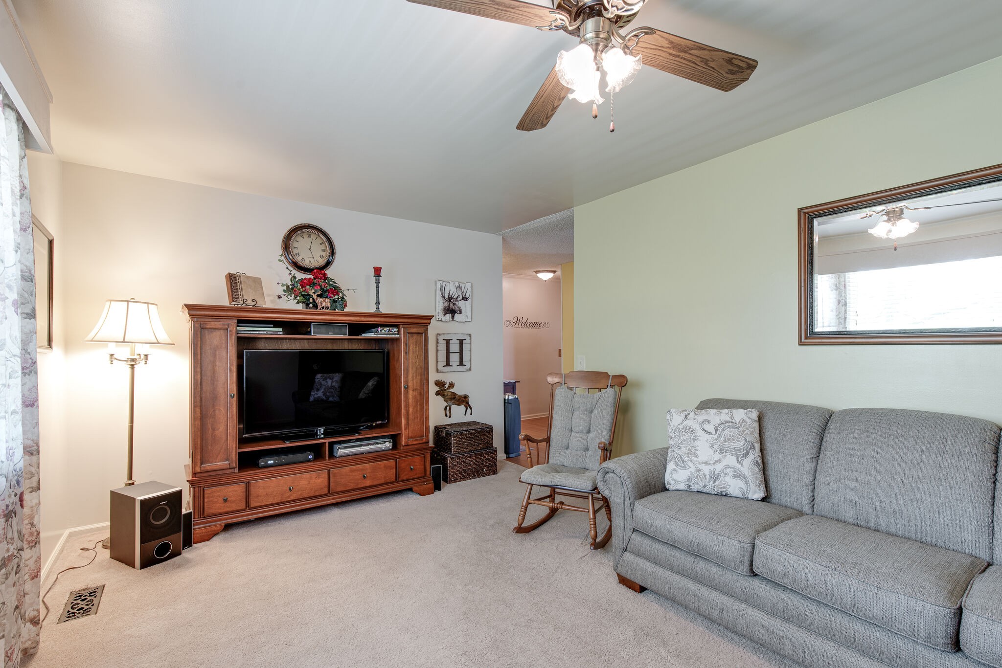 417 Cedarcliff Road Antioch, TN 37013 - Photo 8 of 25 a living room with furniture and a fireplace