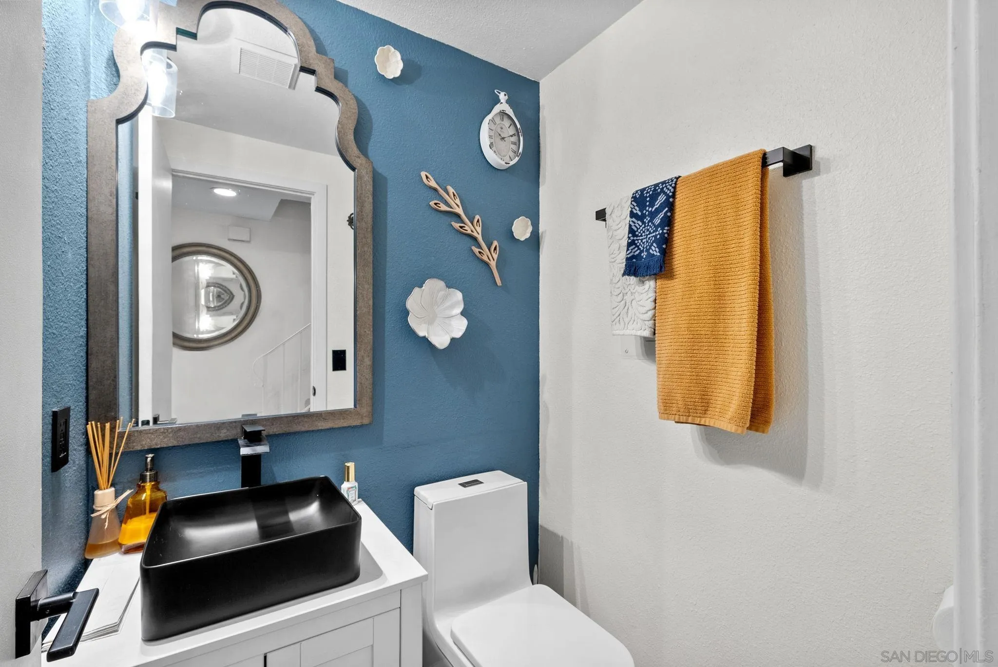 10790 Riderwood Terrace, Unit B Santee, CA 92071 - Photo 16 of 24 a bathroom with a toilet and a sink