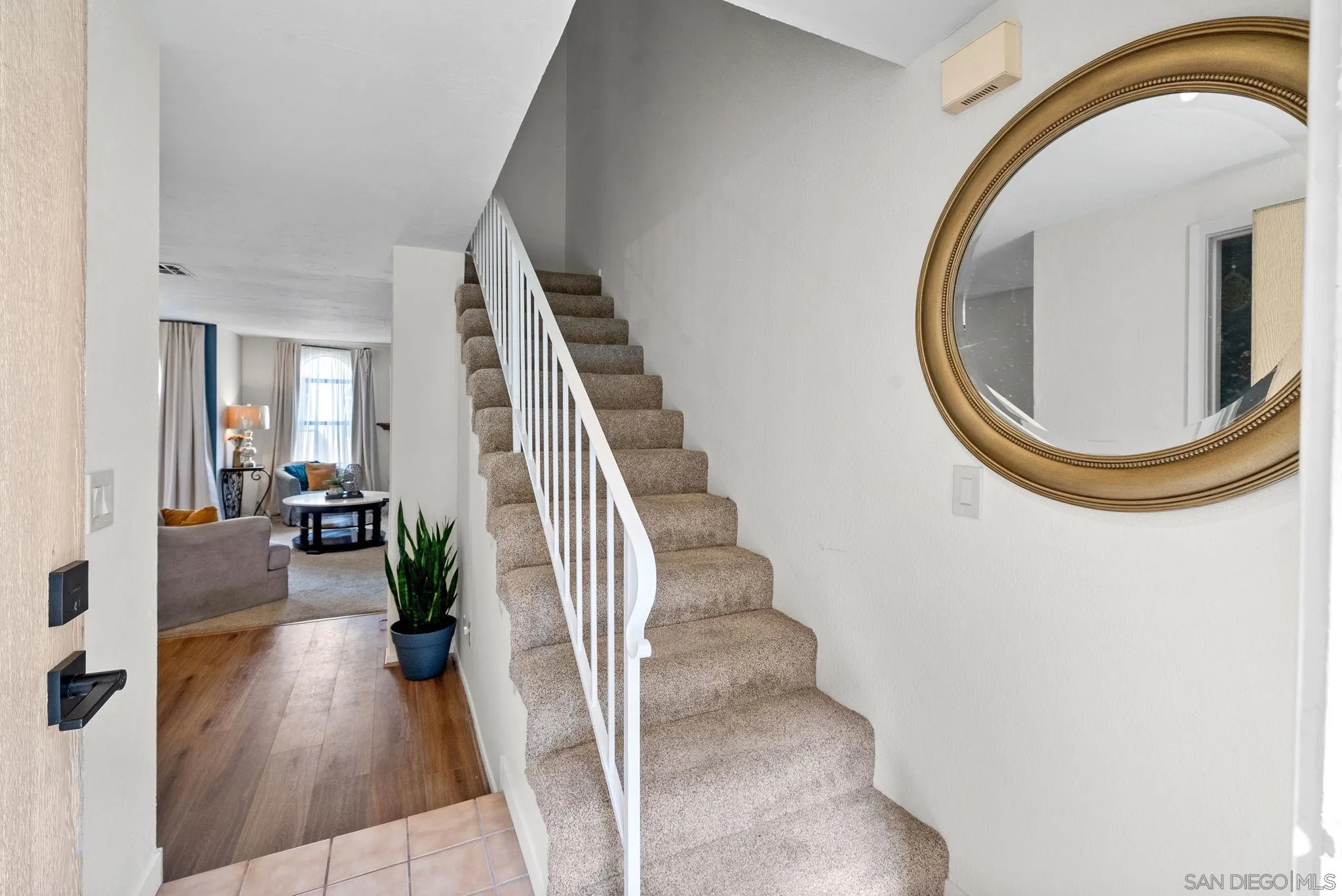 10790 Riderwood Terrace, Unit B Santee, CA 92071 - Photo 17 of 24 a view of a livingroom with furniture and staircase