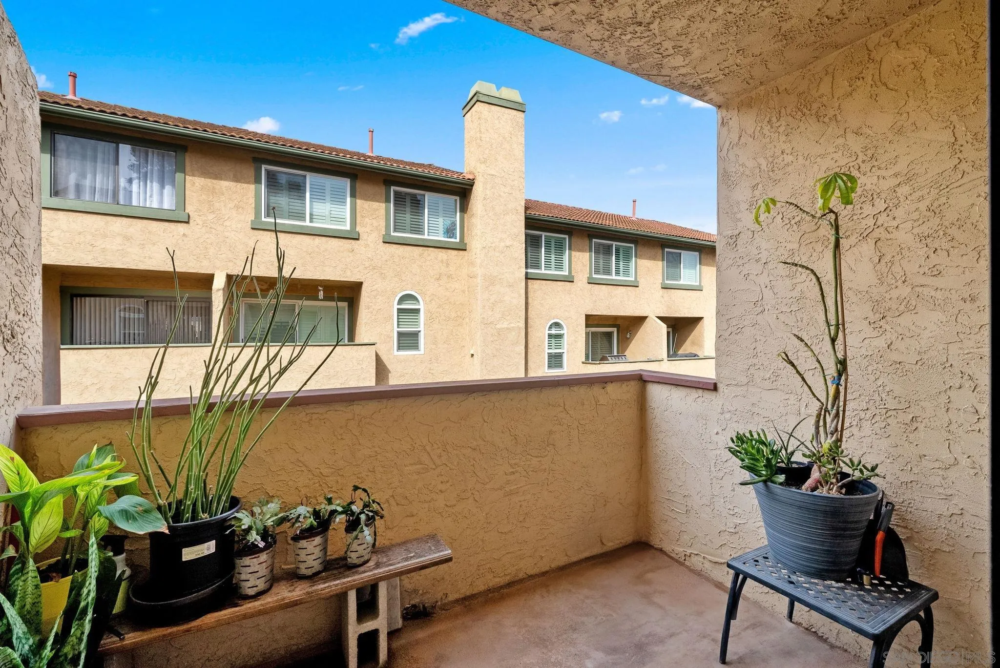 10790 Riderwood Terrace, Unit B Santee, CA 92071 - Photo 20 of 24 a front view of a house with chairs