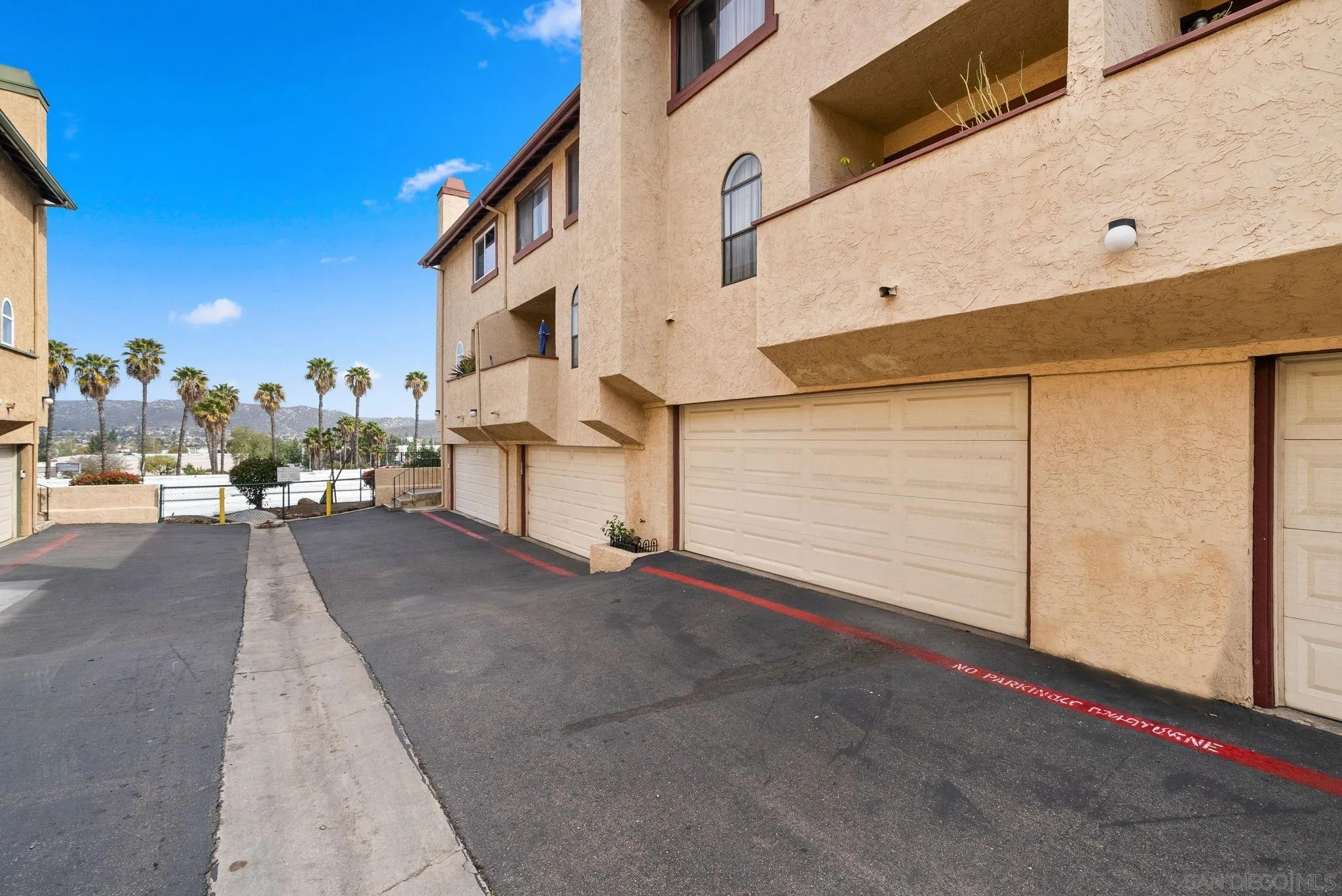 10790 Riderwood Terrace, Unit B Santee, CA 92071 - Photo 24 of 24 a view of a street with buildings