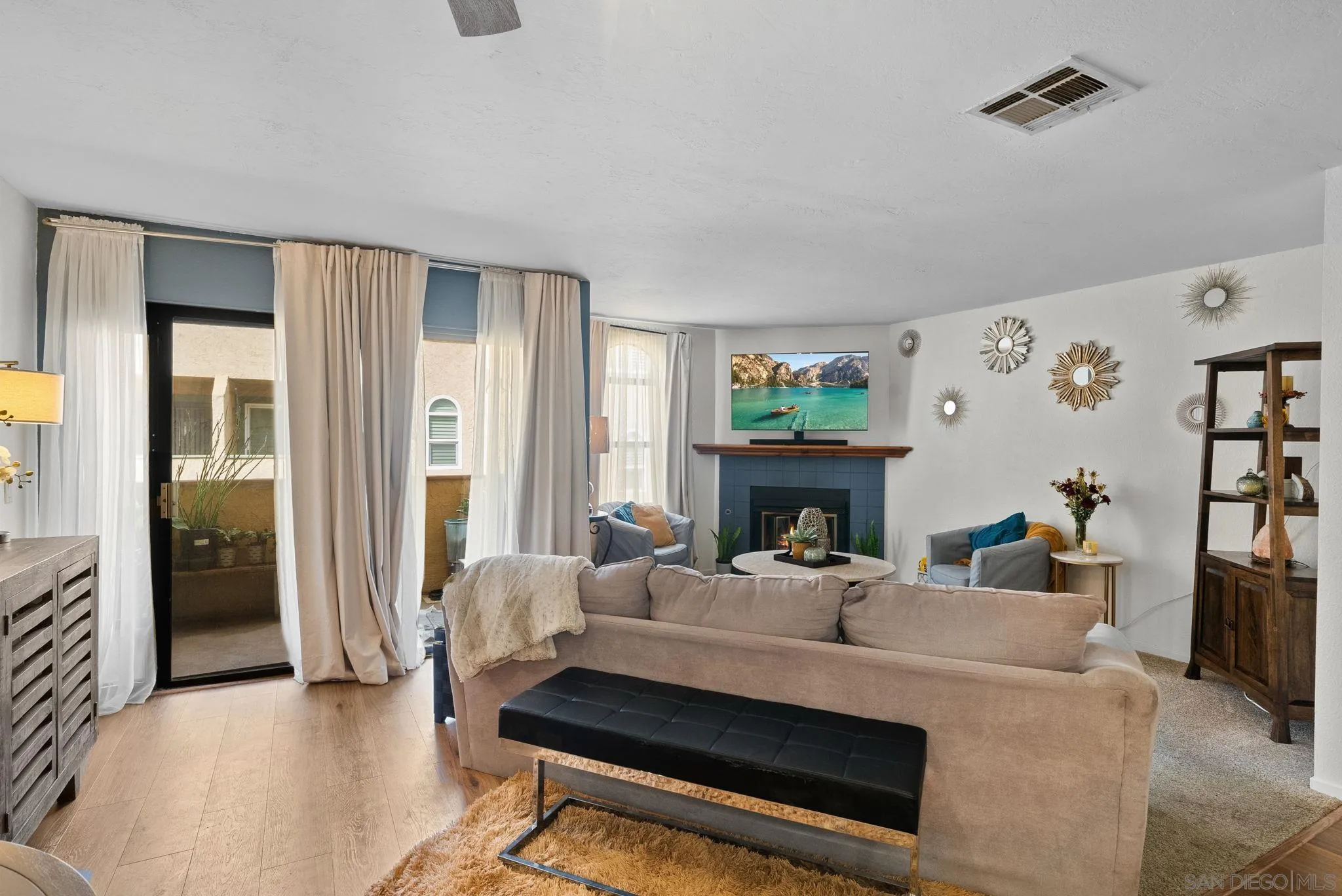 10790 Riderwood Terrace, Unit B Santee, CA 92071 - Photo 6 of 24 a living room with furniture and a fireplace