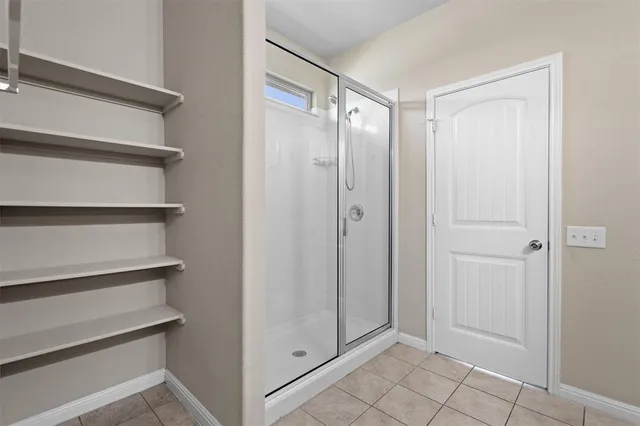 a view of an empty walk in closet