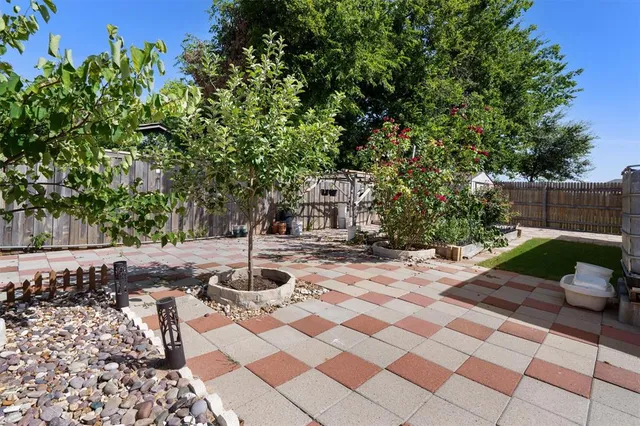 a backyard of a house with seating space