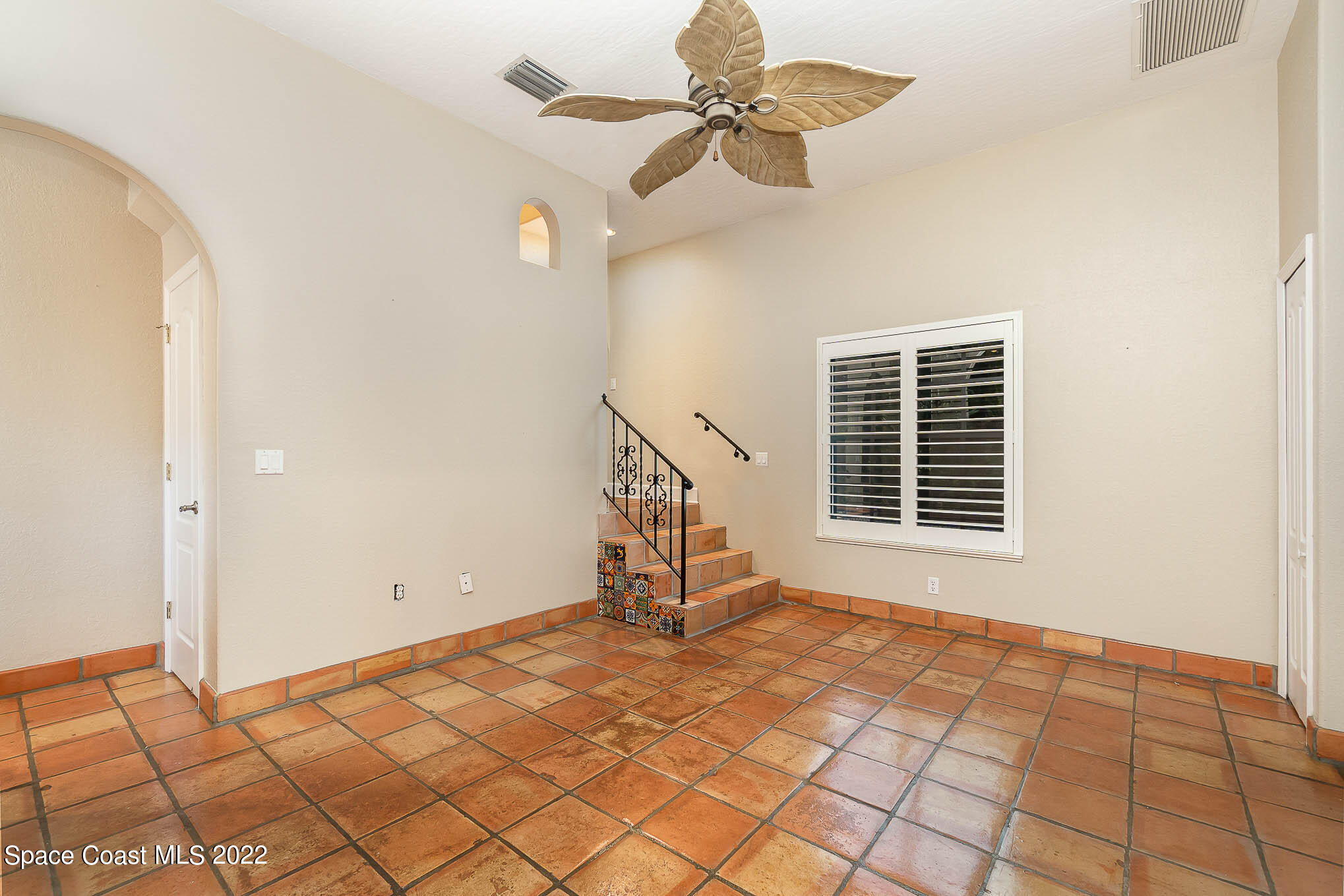 3225 Turtle Mound Road Melbourne, FL 32934 - Photo 8 of 38 a view of an empty room with a window