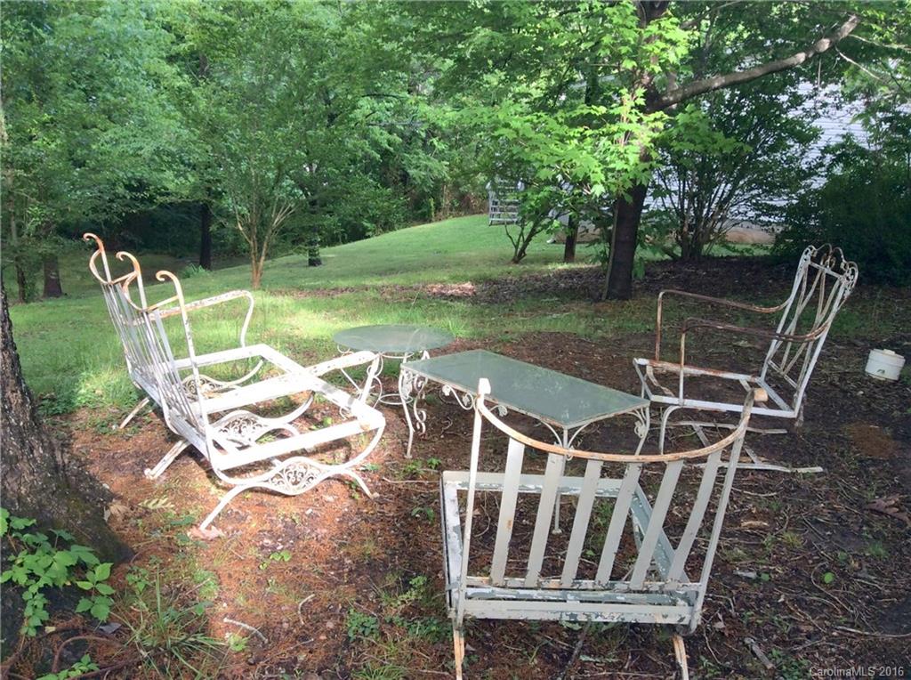 59 Beaver Street Tryon, NC 28782 - Photo 12 of 14 a view of a chairs and table in the patio