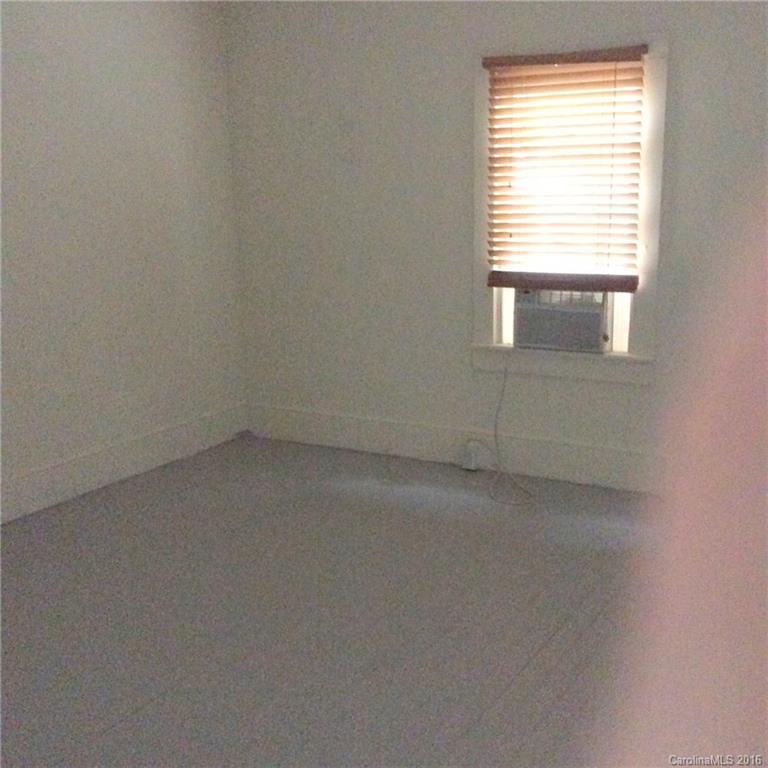 59 Beaver Street Tryon, NC 28782 - Photo 7 of 14 an empty room with a window