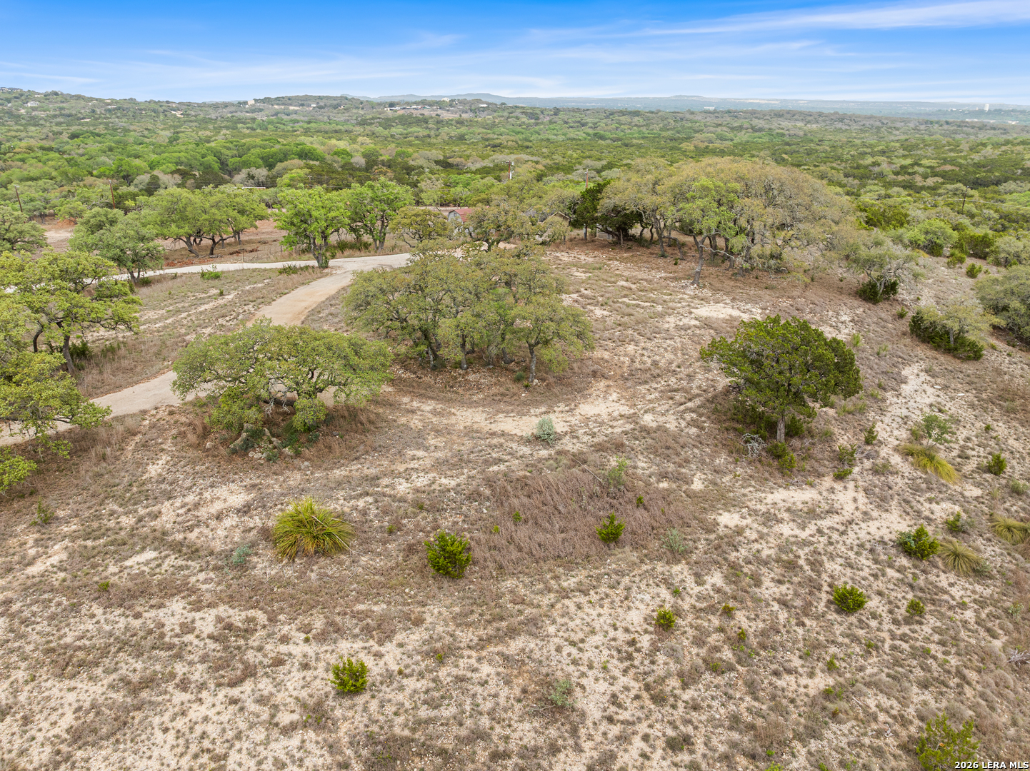 10205 2 Johns Road Boerne, TX 78006 - Photo 23 of 32 a view of an outdoor space with mountain view