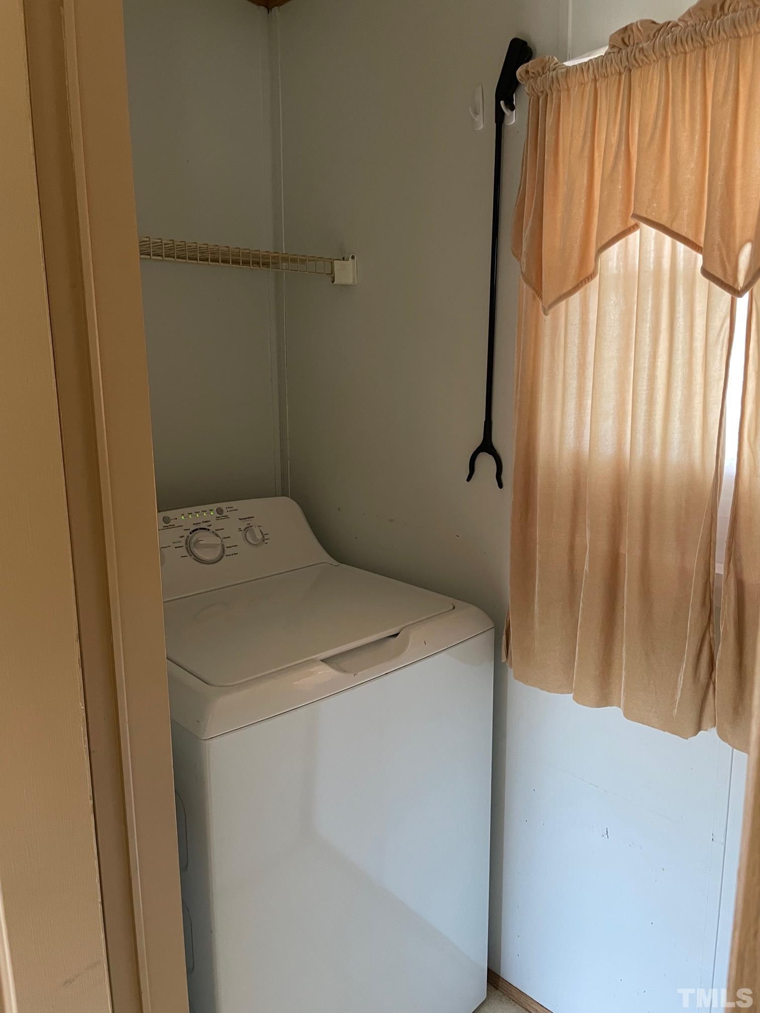 1616 Pope Road Creedmoor, NC 27522 - Photo 31 of 42 a utility room with dryer and washer