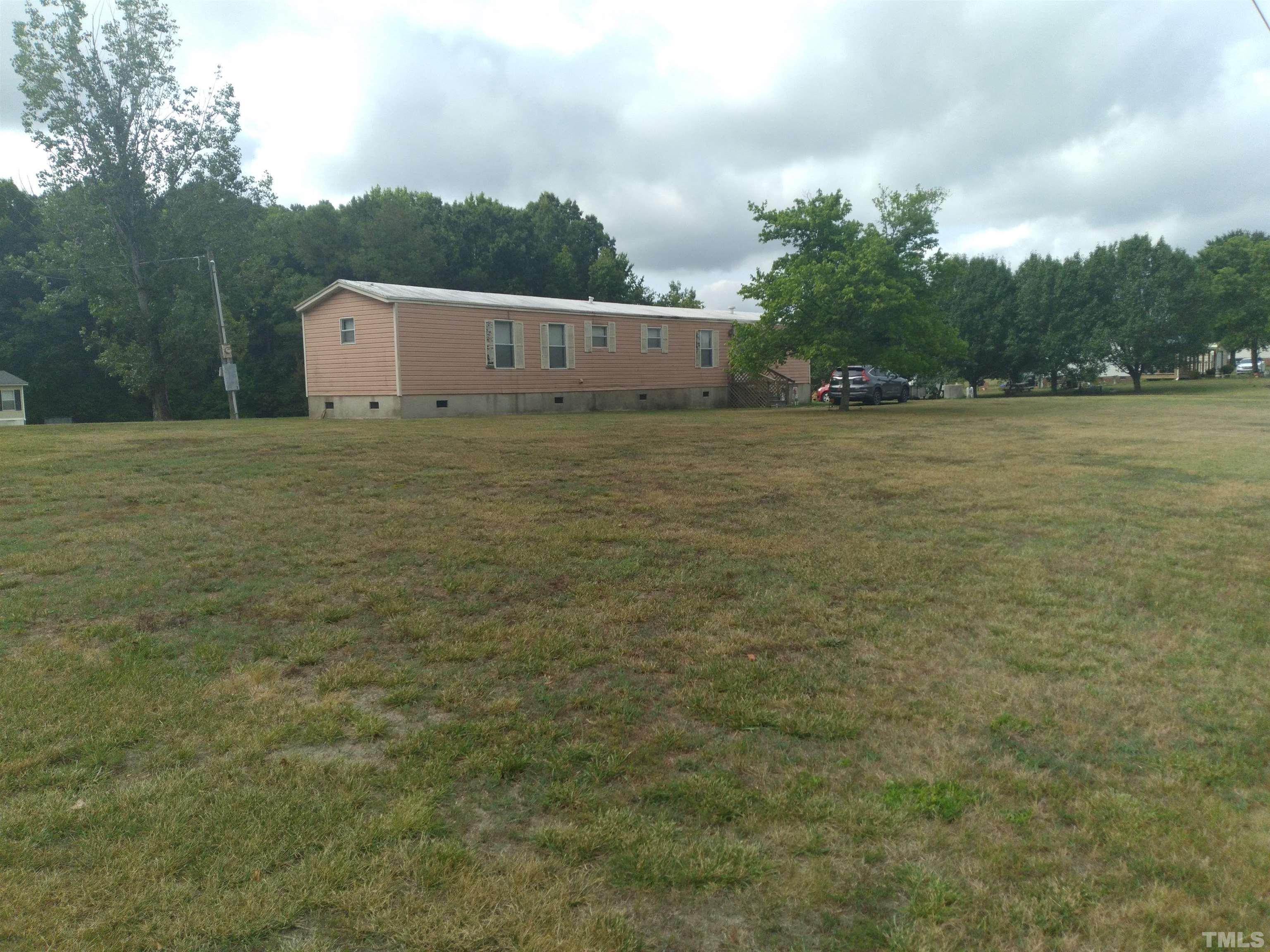 1616 Pope Road Creedmoor, NC 27522 - Photo 5 of 42 a view of outdoor space and yard