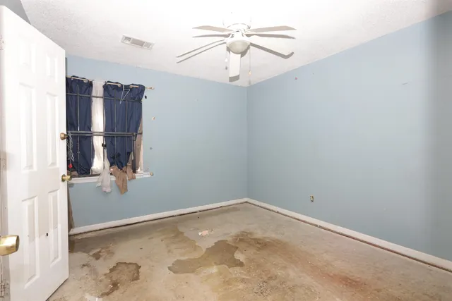 a view of a refrigerator in a room