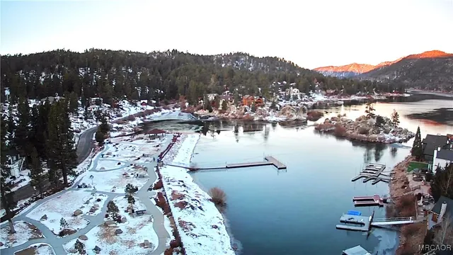 a view of a lake with mountains in the background