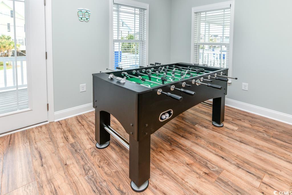 1614 North Ocean Boulevard Surfside Beach, SC 29575 - Photo 10 of 38 Game room with wood finished floors and baseboards