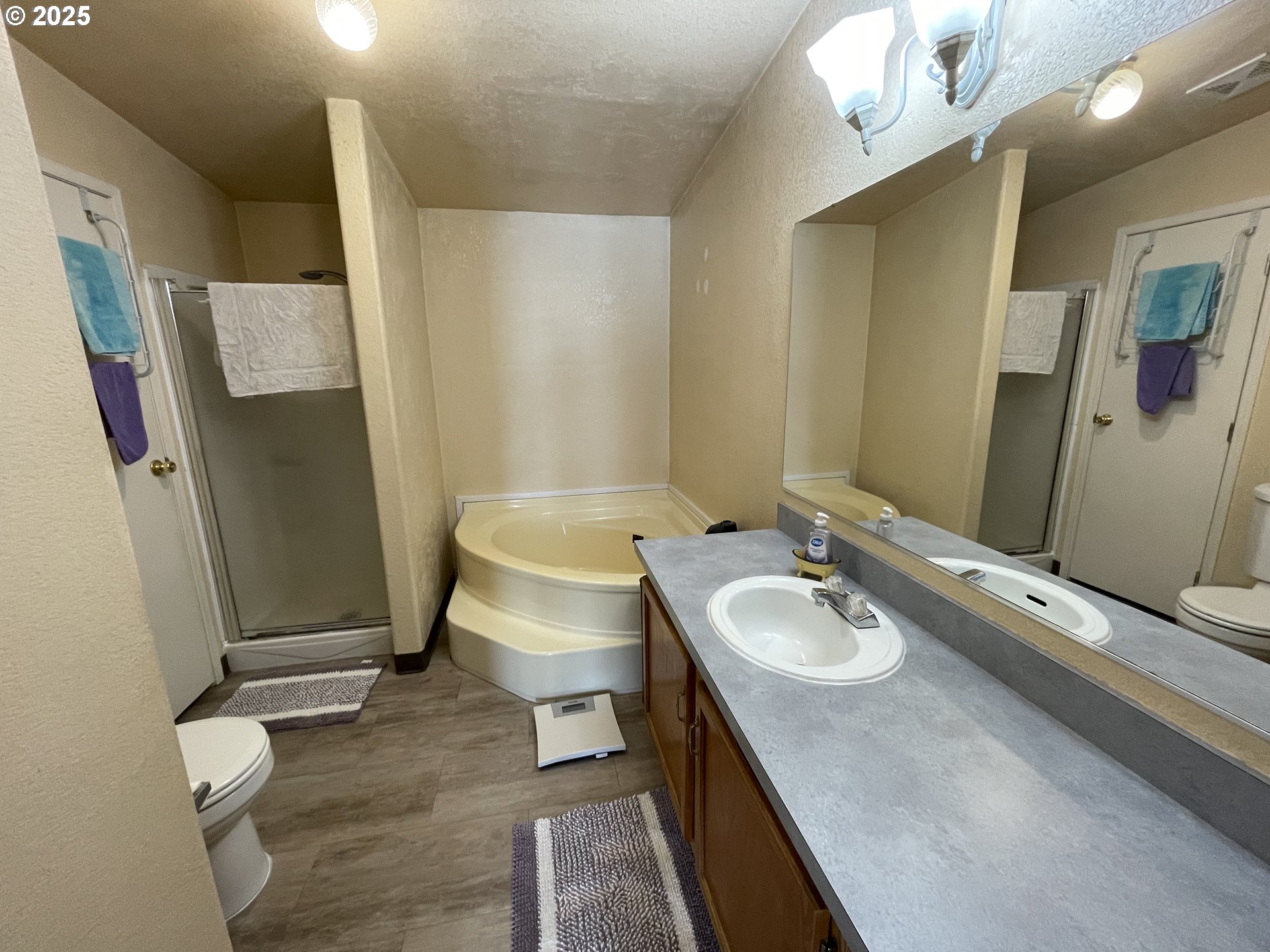 203 Court Street Enterprise, OR 97828 - Photo 15 of 23 a bathroom with a sink toilet and shower