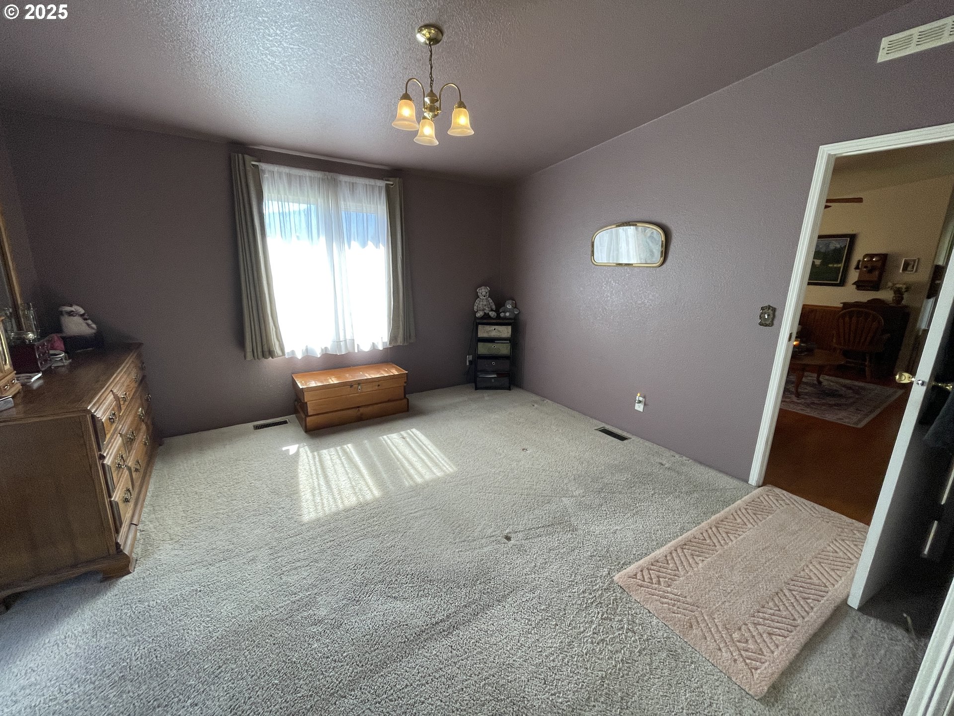 203 Court Street Enterprise, OR 97828 - Photo 16 of 23 a view of an empty room with a window