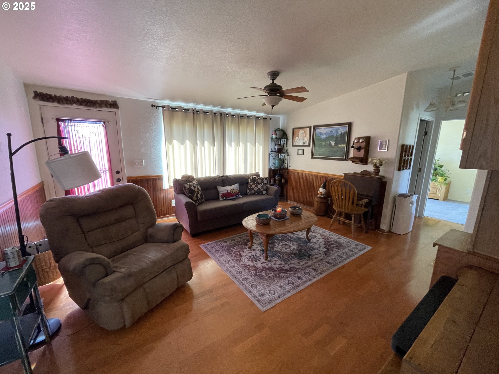 203 Court Street Enterprise, OR 97828 - Photo 20 of 23 a living room with furniture a rug and a window
