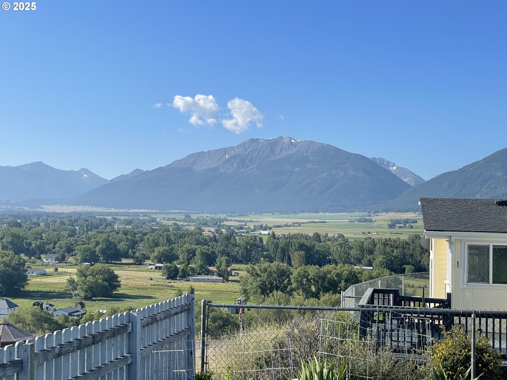 203 Court Street Enterprise, OR 97828 - Photo 2 of 23 a view of a lake with a mountain in the background