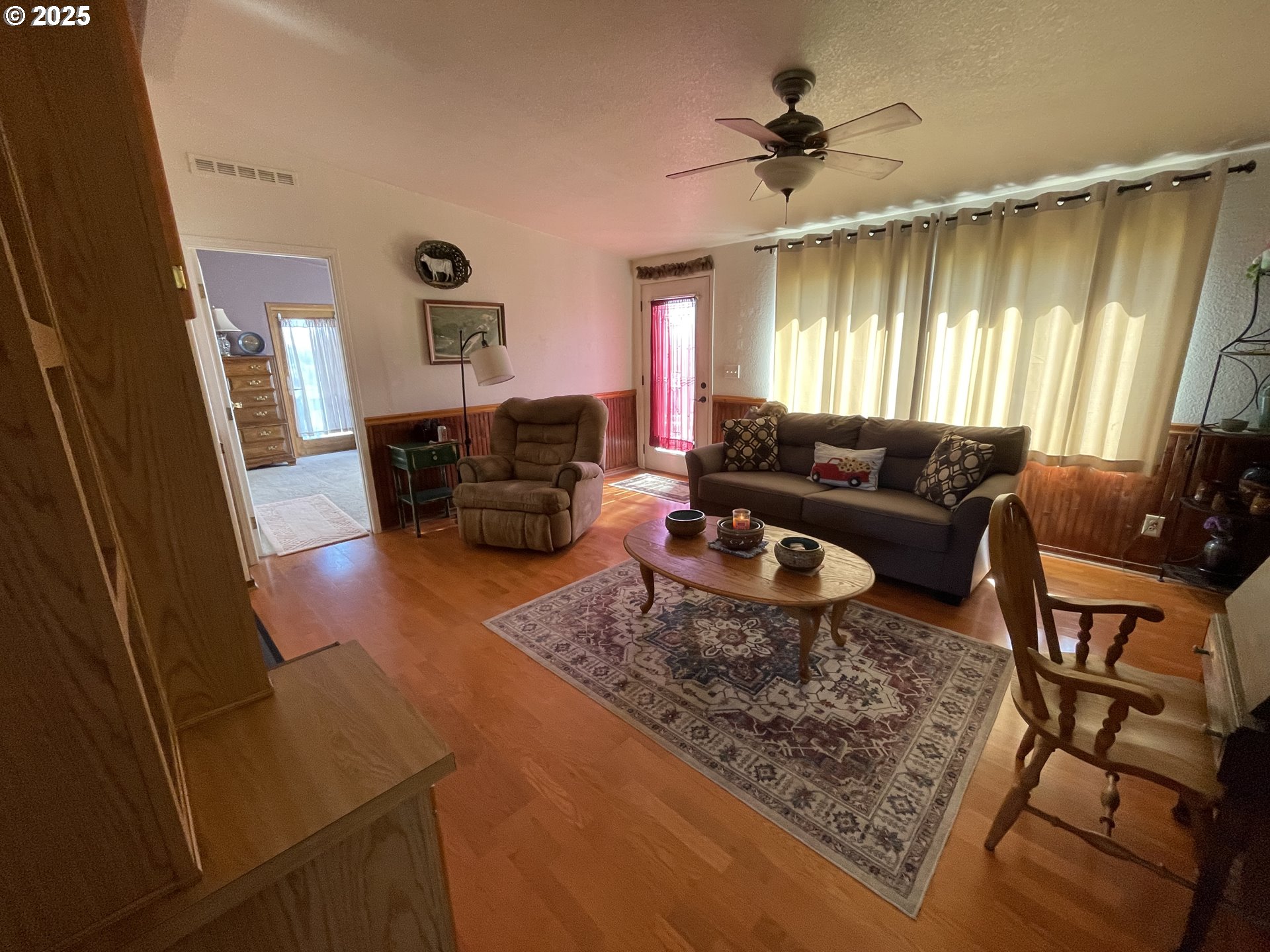 203 Court Street Enterprise, OR 97828 - Photo 21 of 23 a living room with furniture and a large window