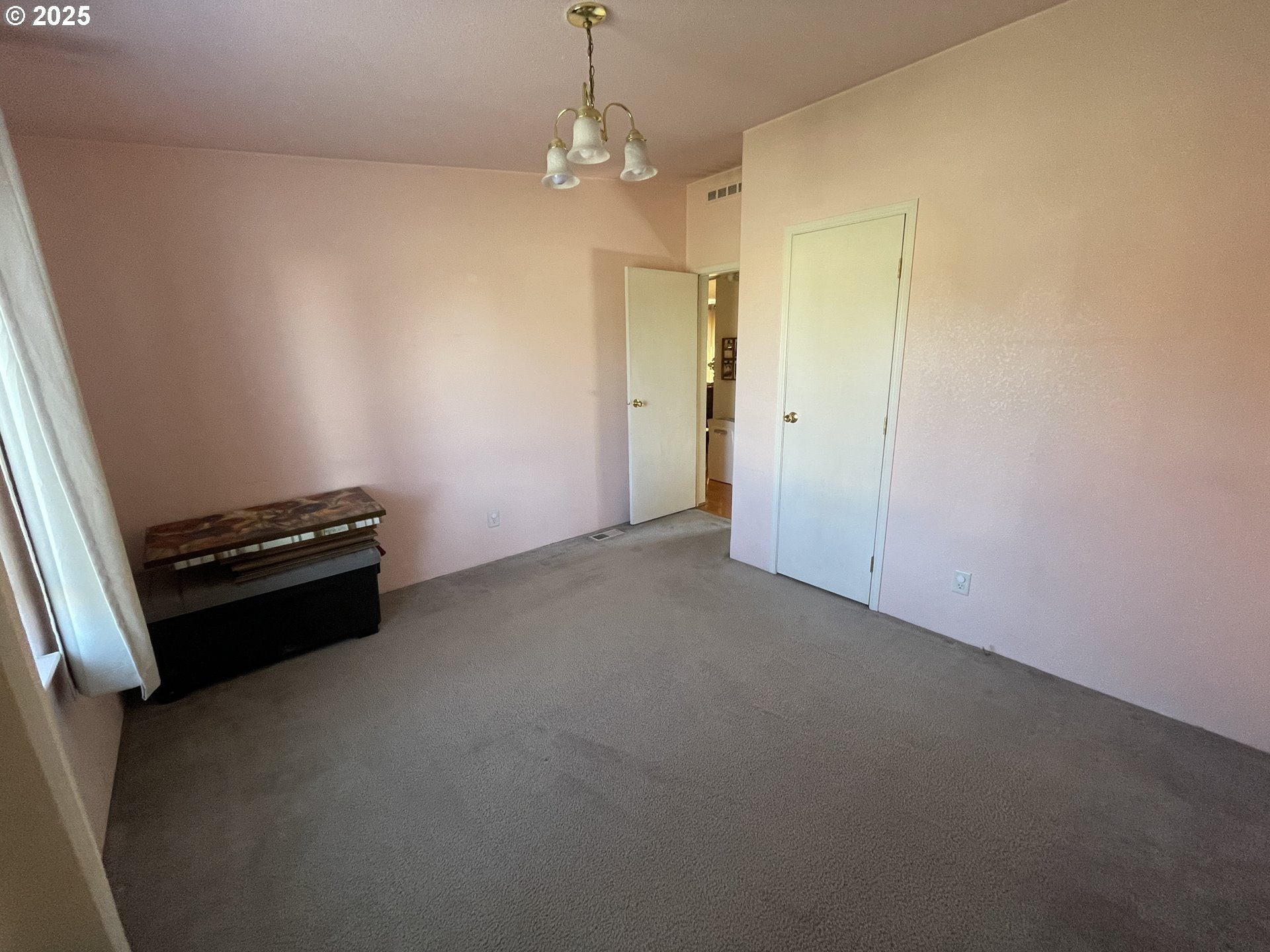 203 Court Street Enterprise, OR 97828 - Photo 22 of 23 a view of a room with a ceiling fan