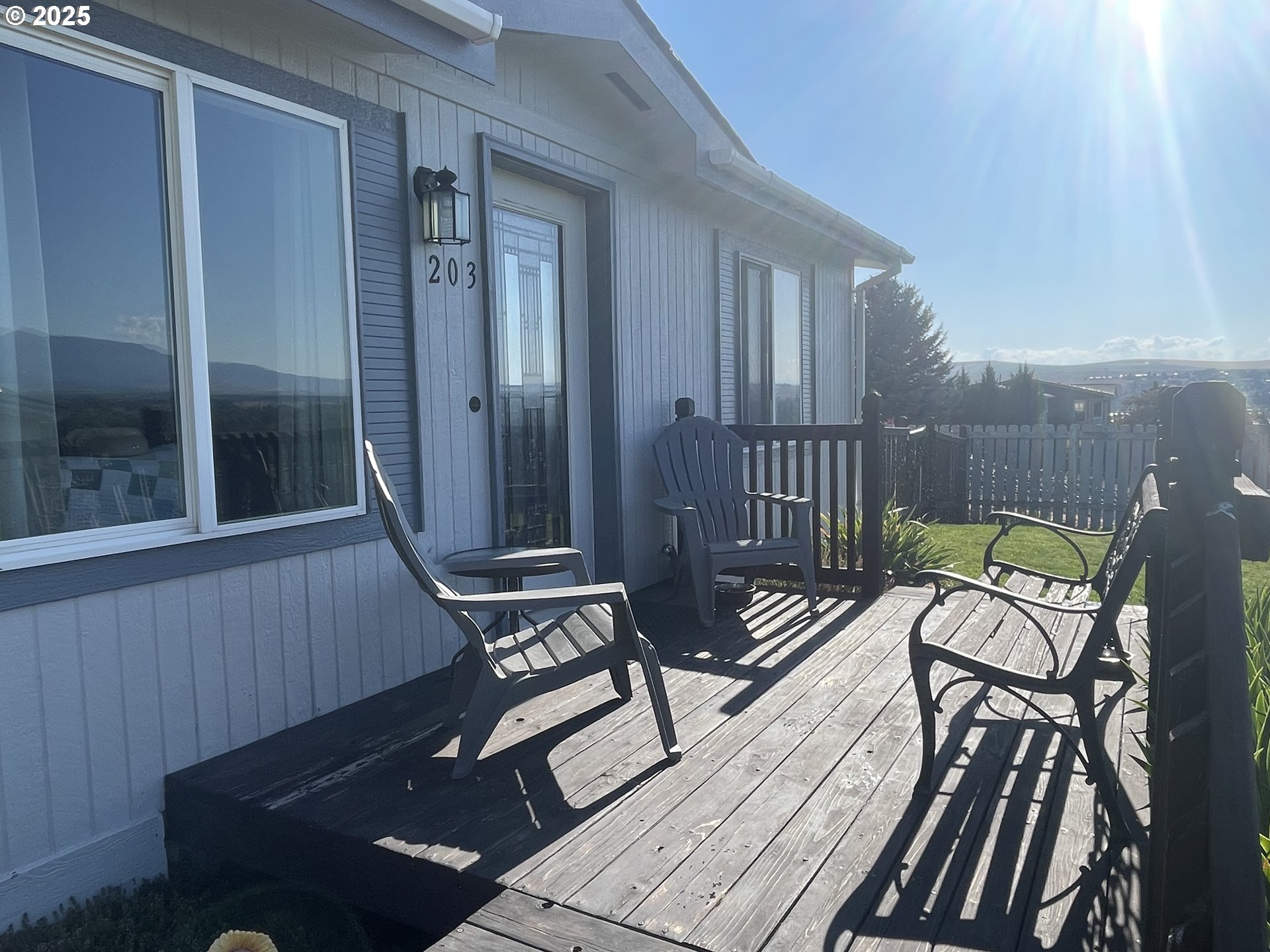 203 Court Street Enterprise, OR 97828 - Photo 4 of 23 a view of a balcony with chairs