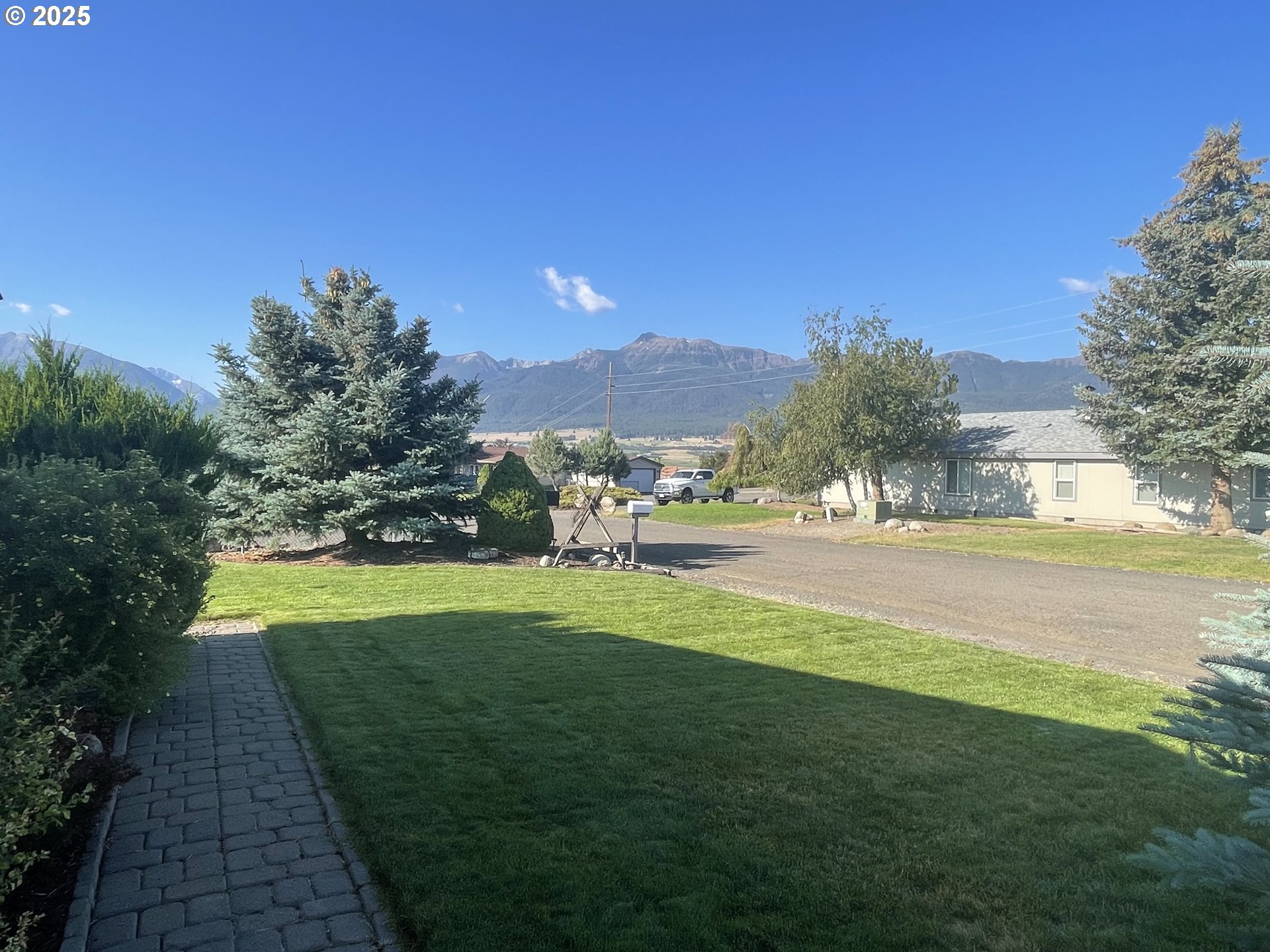 203 Court Street Enterprise, OR 97828 - Photo 6 of 23 a view of building with yard