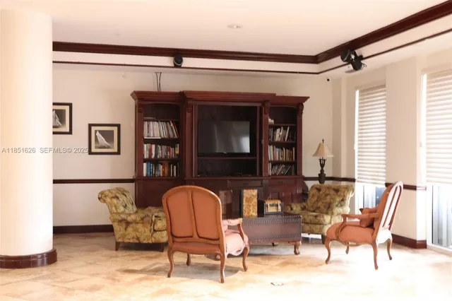 a living room with furniture and a window
