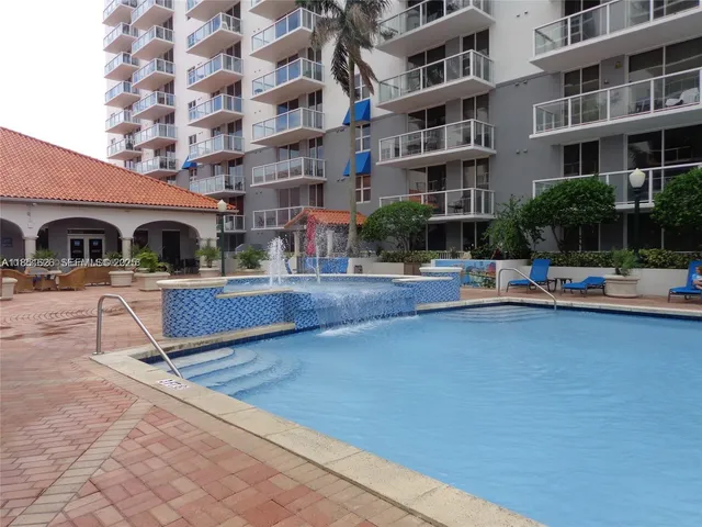 a view of a building with a street