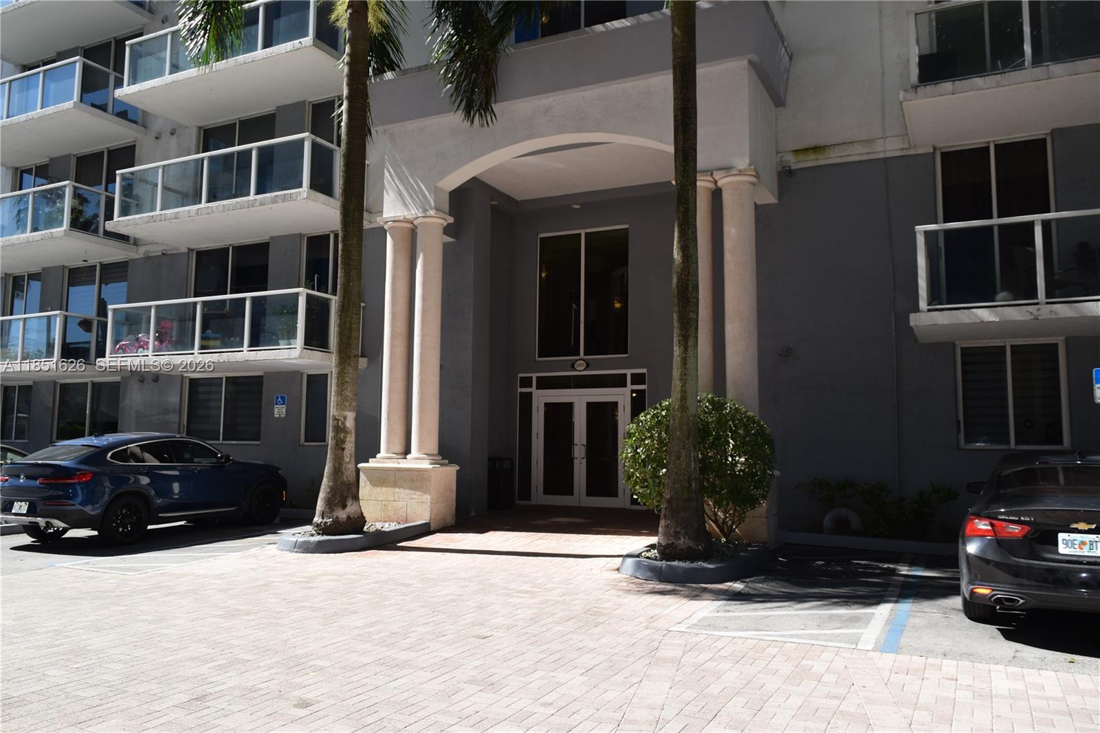 5091 Northwest 7th Street, Unit 711 Miami, FL 33126 - Photo 26 of 72 a car parked in front of a building