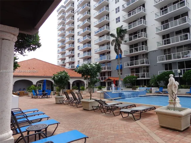 a building outdoor space with patio furniture