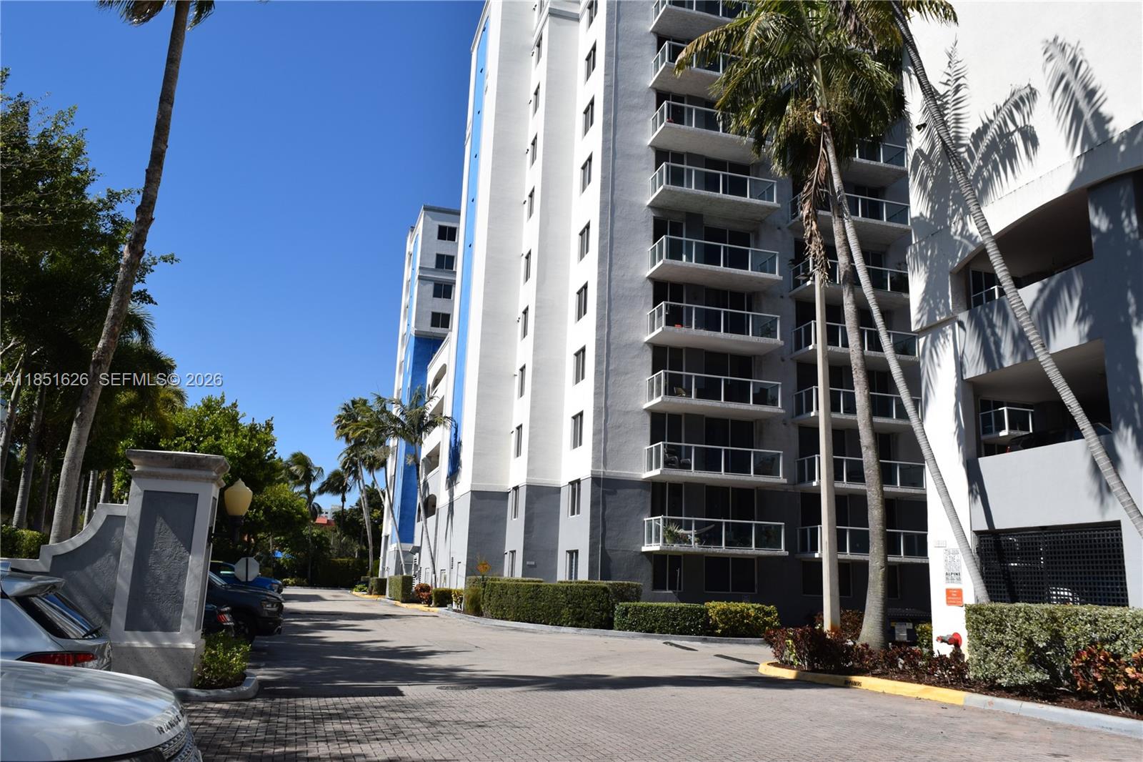 5091 Northwest 7th Street, Unit 711 Miami, FL 33126 - Photo 37 of 72 front view of a building with a street