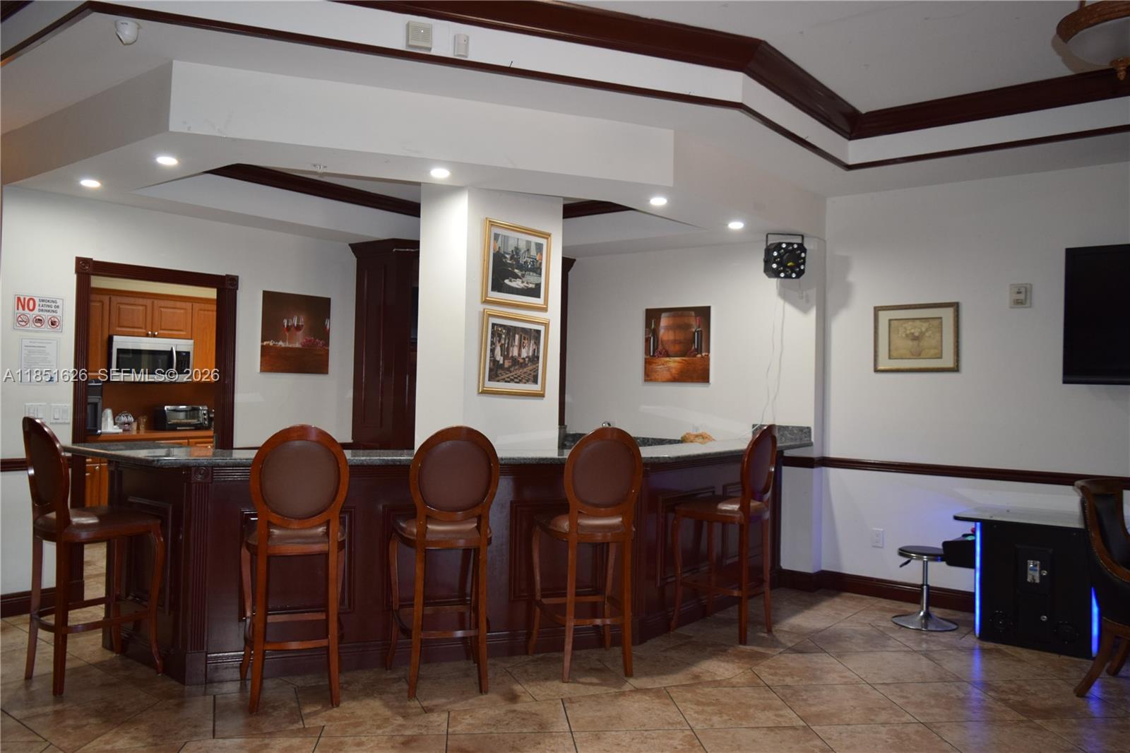 5091 Northwest 7th Street, Unit 711 Miami, FL 33126 - Photo 44 of 72 a dining room with furniture