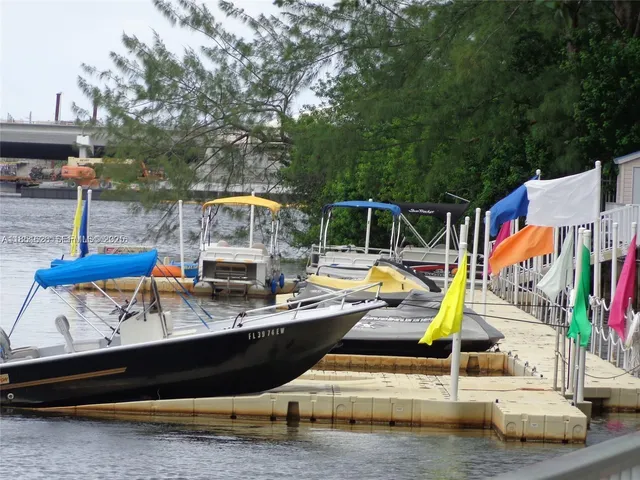 a view of swimming pool with sitting area