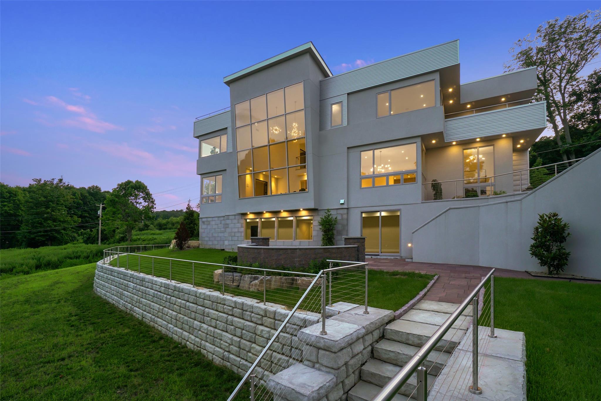 a view of a chairs in a backyard