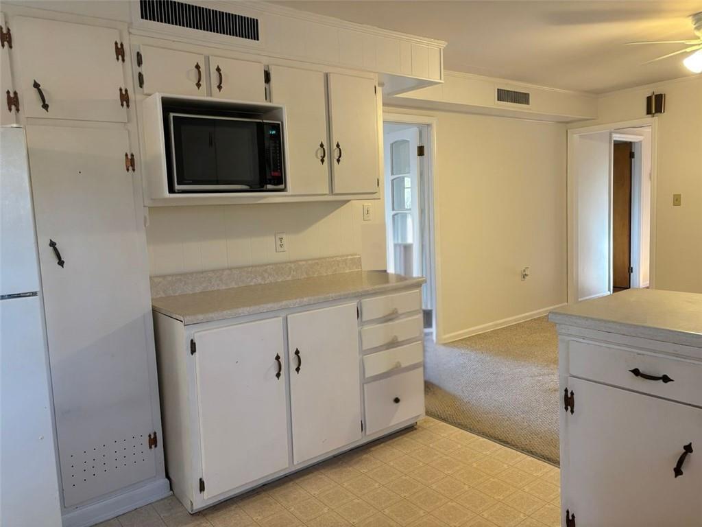 814 Shannon Circle Northeast Rome, GA 30161 - Photo 15 of 47 a view of cabinets and wooden floor
