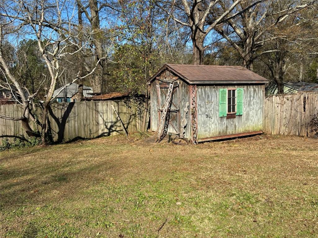 814 Shannon Circle Northeast Rome, GA 30161 - Photo 32 of 47 a view of a backyard of a house