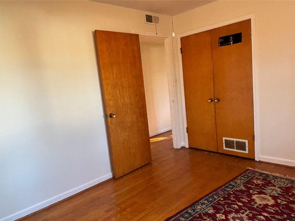 814 Shannon Circle Northeast Rome, GA 30161 - Photo 34 of 47 a view of a room with wooden floor