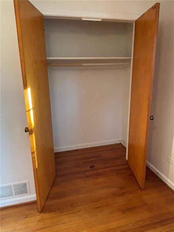 814 Shannon Circle Northeast Rome, GA 30161 - Photo 40 of 47 a view of an empty room with wooden floor and a window