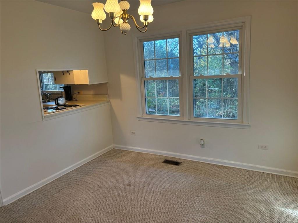 814 Shannon Circle Northeast Rome, GA 30161 - Photo 8 of 47 an empty room with a window