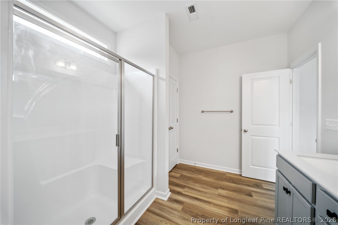 4047 Church Street Wade, NC 28395 - Photo 11 of 30 a bathroom with a bathtub and a shower