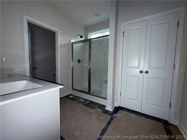 a view of an empty walk in closet