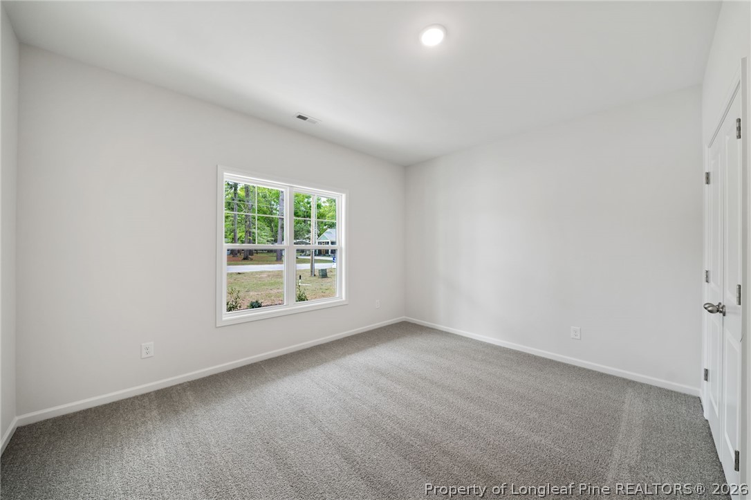 4047 Church Street Wade, NC 28395 - Photo 18 of 30 an empty room with a window