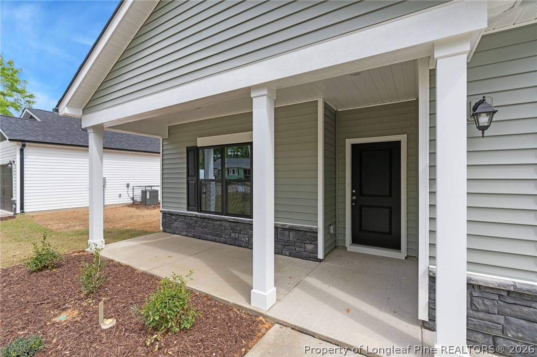 4047 Church Street Wade, NC 28395 - Photo 2 of 30 a view of a backyard of the house