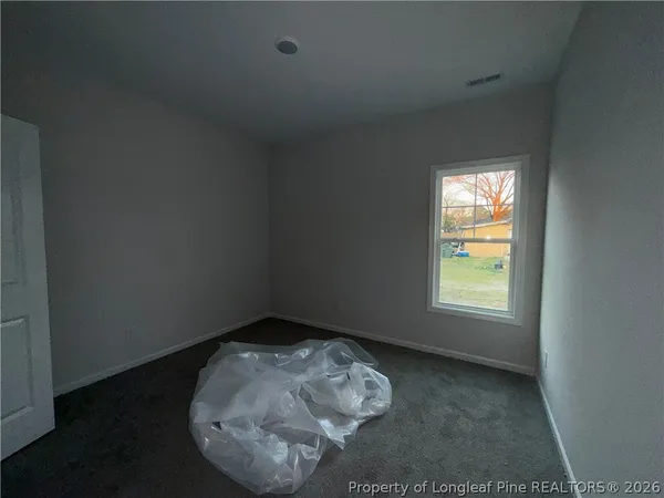 a bathroom with 2 sink and a mirror